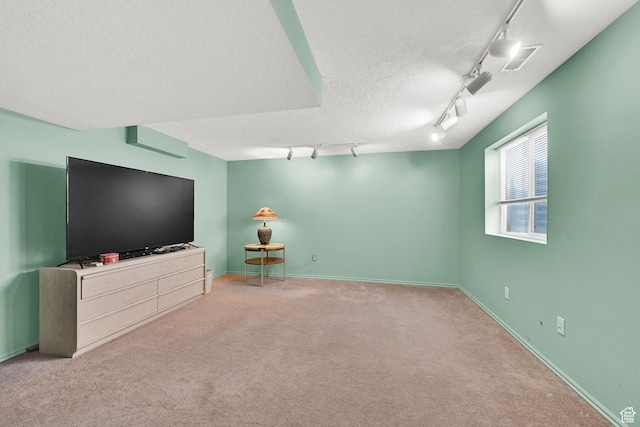59 Belmore Dr, Kaysville, UT 84037 - living area with visible vents, baseboards, light colored carpet, a textured ceiling, and track lighting