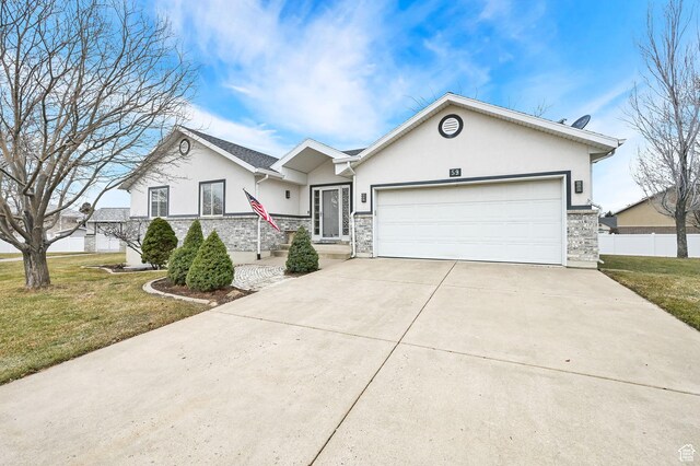 59 Belmore Dr, Kaysville, UT 84037 - ranch-style house featuring a front lawn, concrete driveway, an attached garage, and stucco siding