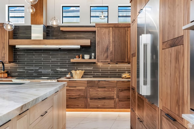 kitchen with hanging light fixtures, marble finish floor, tasteful backsplash, and open shelves