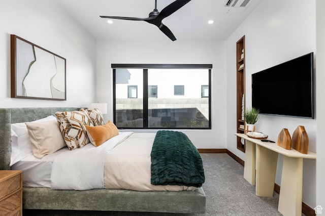 bedroom featuring carpet, a fireplace, recessed lighting, a ceiling fan, and baseboards