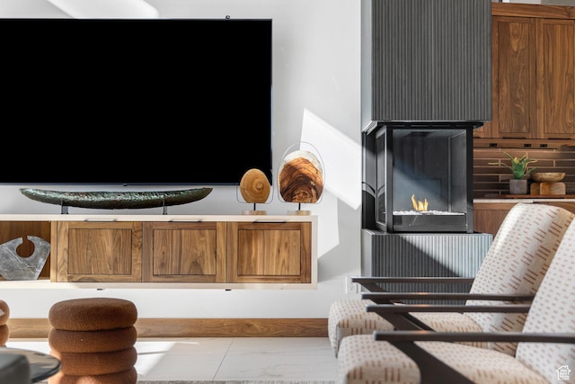 sitting room with a fireplace