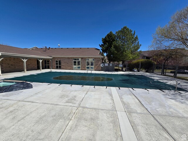 8204 N Cedar Springs Rd E Unit U-12, Eagle Mountain, UT 84005 - view of swimming pool featuring a patio area, a fenced in pool, and fence