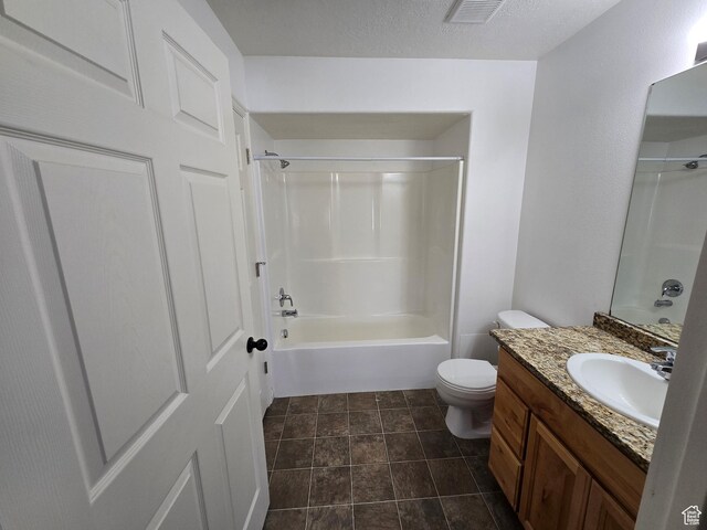 8204 N Cedar Springs Rd E Unit U-12, Eagle Mountain, UT 84005 - full bath with bathing tub / shower combination, a textured ceiling, vanity, visible vents, and toilet