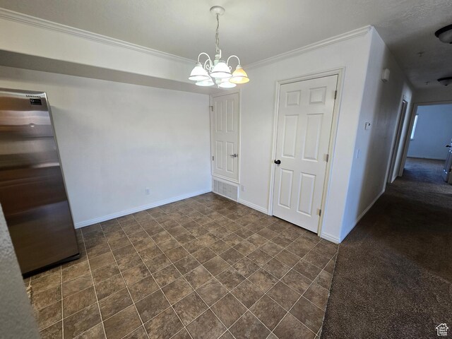 8204 N Cedar Springs Rd E Unit U-12, Eagle Mountain, UT 84005 - unfurnished dining area with a notable chandelier, ornamental molding, and baseboards