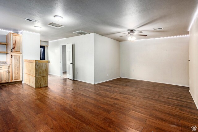 170 S 500 E, Duchesne, UT 84021 - spare room featuring dark wood-style floors, a textured ceiling, visible vents, and attic access