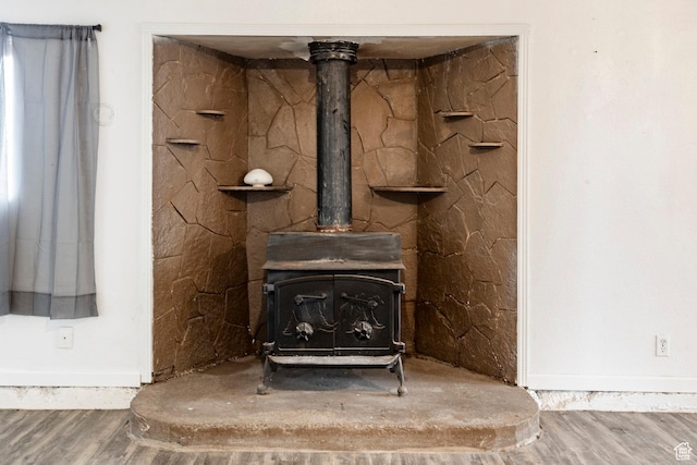 170 S 500 E, Duchesne, UT 84021 - details featuring a wood stove and wood finished floors