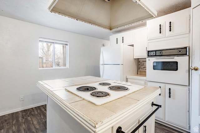 170 S 500 E, Duchesne, UT 84021 - kitchen with tile countertops, white appliances, white cabinets, and dark wood-style flooring