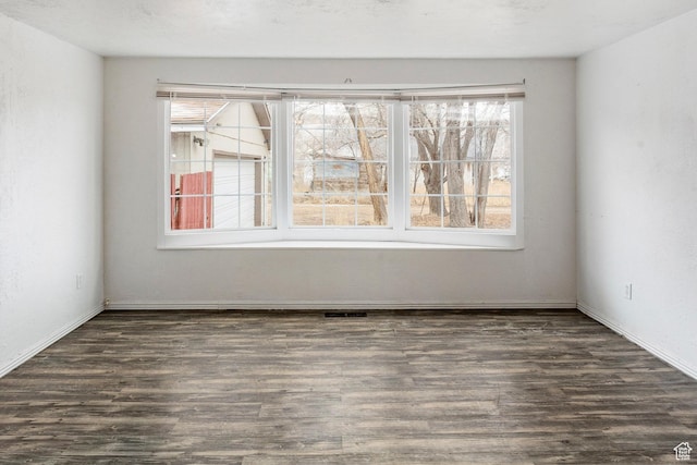170 S 500 E, Duchesne, UT 84021 - empty room with dark wood finished floors and visible vents