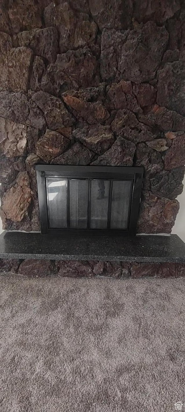 room details featuring a fireplace