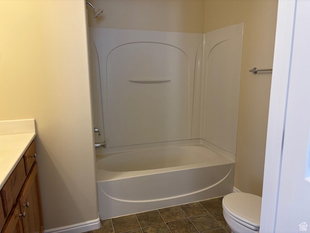 1829 W 1120 S Unit 128, Springville, UT 84663 - bathroom with shower / bathing tub combination, toilet, vanity, baseboards, and tile patterned floors