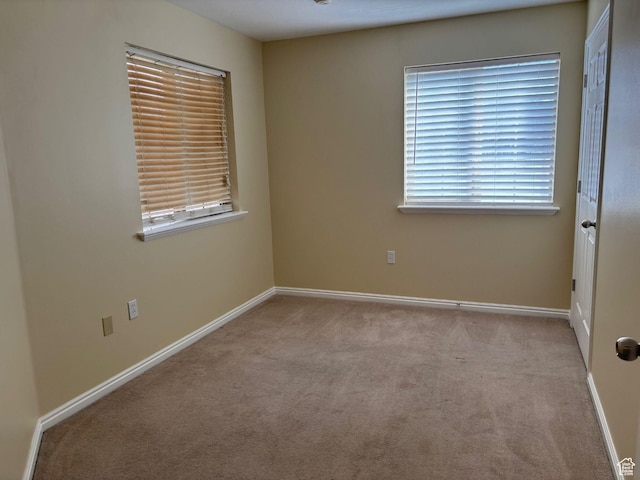 1829 W 1120 S Unit 128, Springville, UT 84663 - spare room featuring light carpet and baseboards