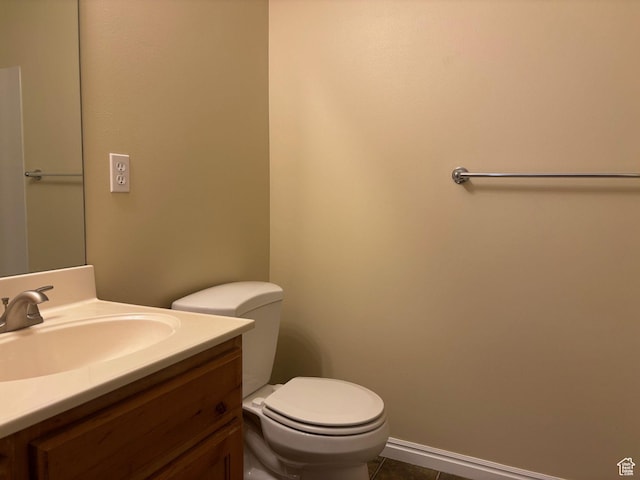 1829 W 1120 S Unit 128, Springville, UT 84663 - half bathroom featuring baseboards, vanity, toilet, and tile patterned floors