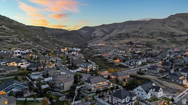 bird's eye view with a residential view and a mountain view