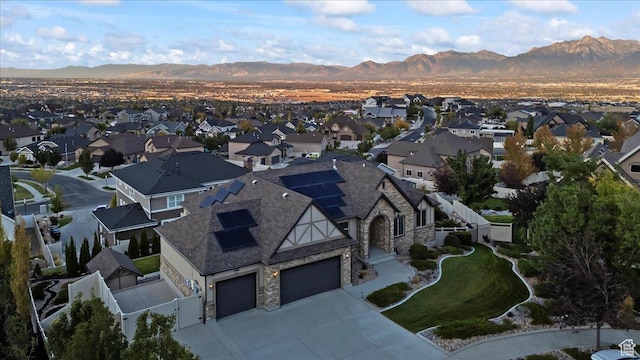 bird's eye view featuring a residential view and a mountain view
