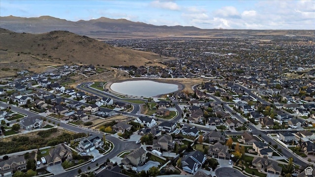 drone / aerial view with a residential view and a mountain view