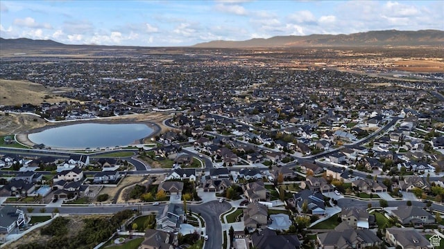aerial view with a residential view and a water and mountain view