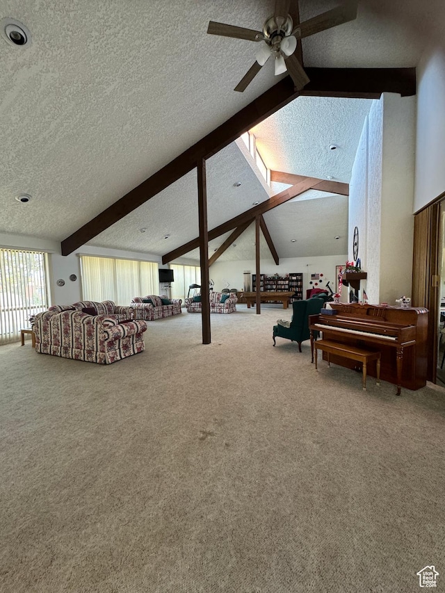 1526 N Dixie Downs Rd N 36, St George, UT 84770 - living area featuring vaulted ceiling with beams, a textured ceiling, carpet, and a ceiling fan