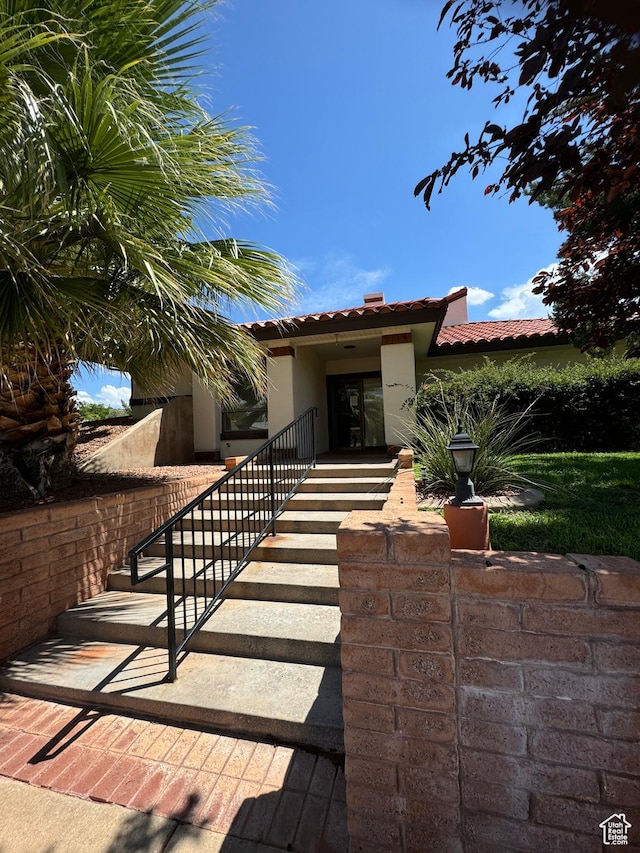 1526 N Dixie Downs Rd N 36, St George, UT 84770 - view of front of house with a tile roof and stucco siding