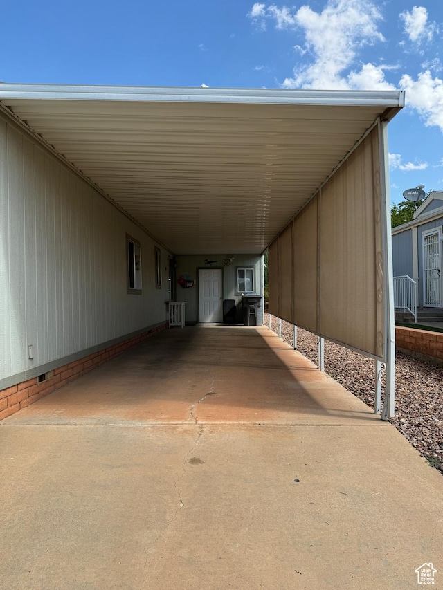 1526 N Dixie Downs Rd N 36, St George, UT 84770 - view of vehicle parking featuring concrete driveway and an attached carport