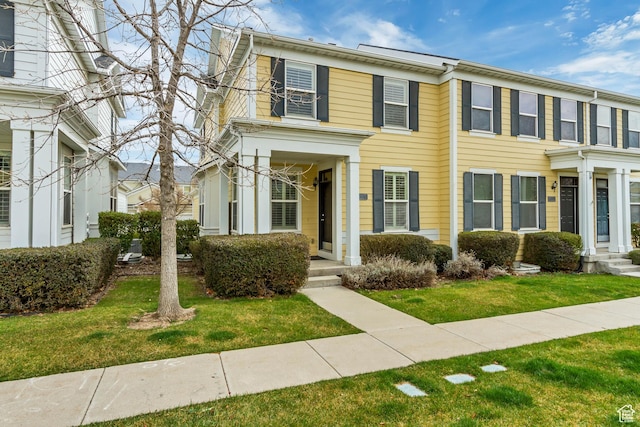 view of front of house with a front lawn