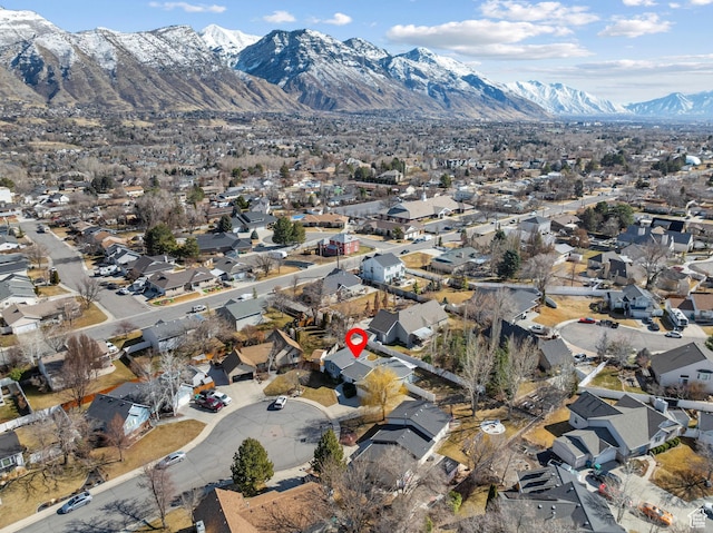 bird's eye view with a residential view and a mountain view