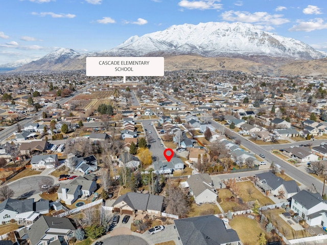 bird's eye view with a residential view and a mountain view