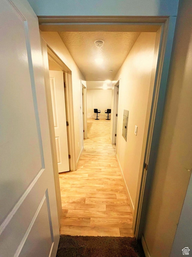 154 E 7th St S Unit A101, Ogden, UT 84404 - hallway with light wood-type flooring and baseboards