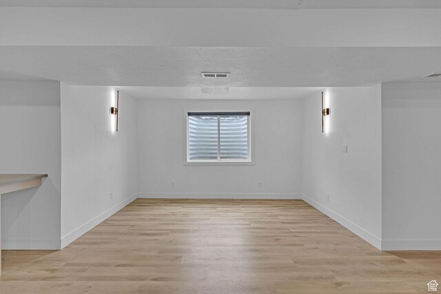 680 E 525 N, Providence, UT 84332 - empty room with light wood finished floors, baseboards, and visible vents