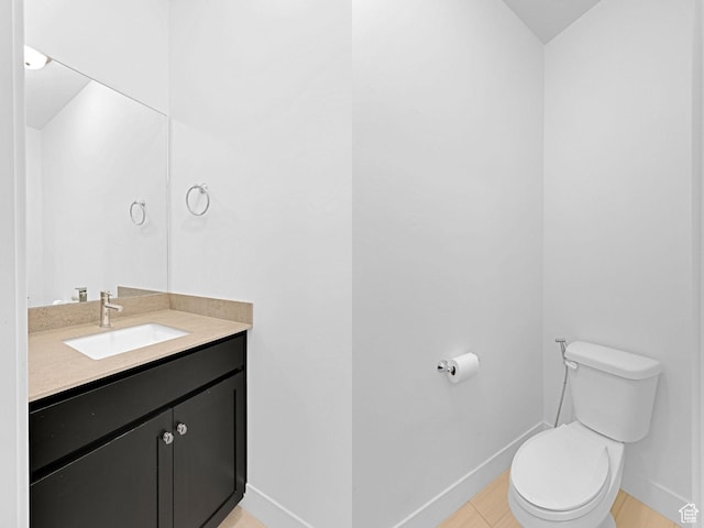 680 E 525 N, Providence, UT 84332 - half bathroom featuring toilet, baseboards, and vanity