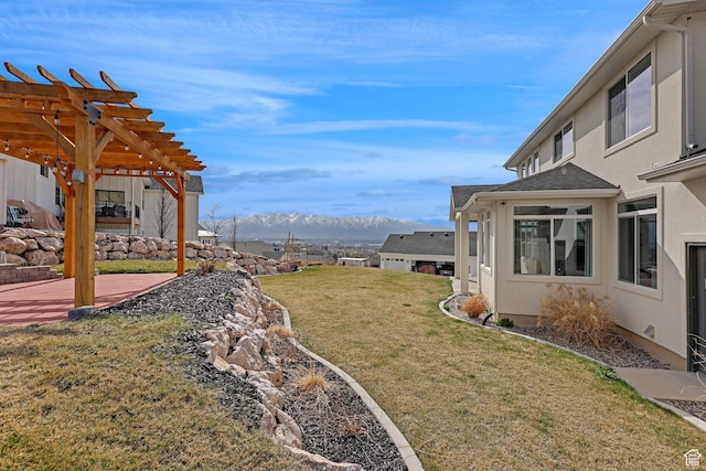 680 E 525 N, Providence, UT 84332 - view of yard featuring a mountain view, a patio, and a pergola