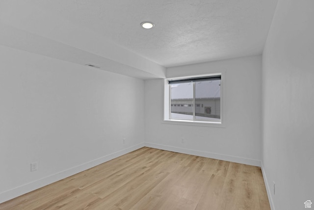 680 E 525 N, Providence, UT 84332 - spare room with light wood-type flooring, baseboards, and visible vents