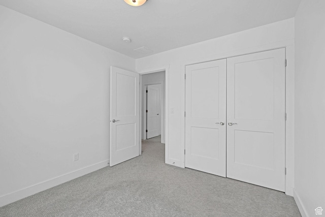 680 E 525 N, Providence, UT 84332 - unfurnished bedroom featuring a closet, baseboards, and carpet