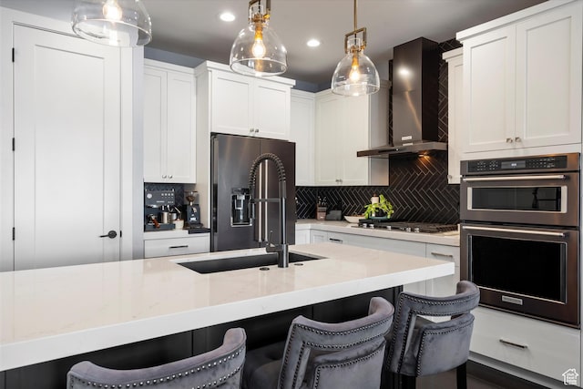 1313 E Daffodil Ct, Layton, UT 84040 - kitchen featuring double wall oven, wall chimney exhaust hood, white cabinets, and pendant lighting