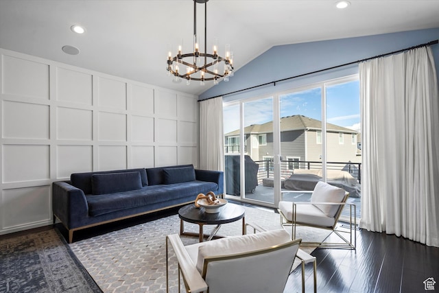 1313 E Daffodil Ct, Layton, UT 84040 - living room with lofted ceiling, dark wood-style floors, an inviting chandelier, a decorative wall, and recessed lighting