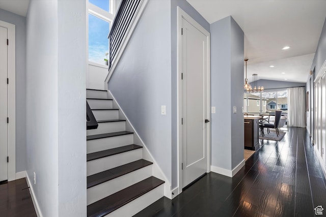1313 E Daffodil Ct, Layton, UT 84040 - stairs with lofted ceiling, a notable chandelier, recessed lighting, wood finished floors, and baseboards