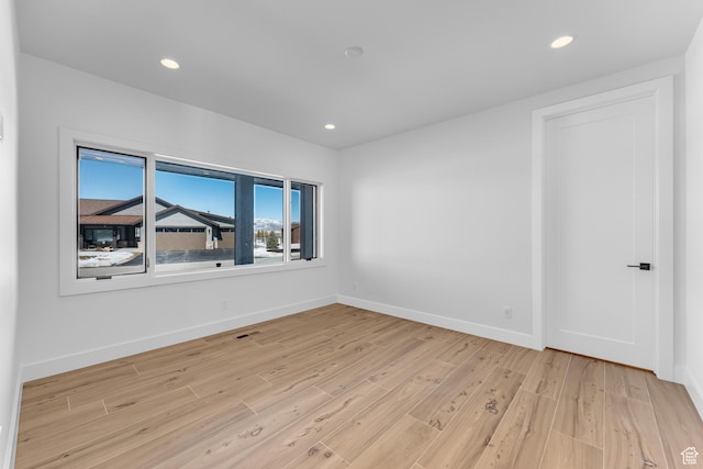 272 Thorn Creek Dr, Kamas, UT 84036 - spare room with light wood-style floors, baseboards, and recessed lighting