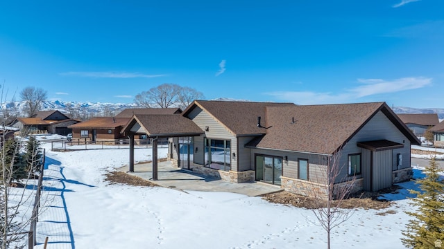 272 Thorn Creek Dr, Kamas, UT 84036 - view of front of home with stone siding and a shingled roof