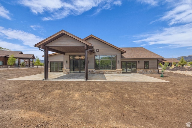 272 Thorn Creek Dr, Kamas, UT 84036 - rear view of house with a patio area and stone siding