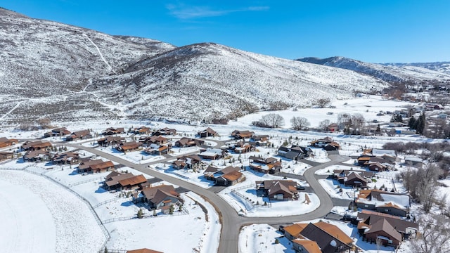 272 Thorn Creek Dr, Kamas, UT 84036 - snowy aerial view featuring a mountain view and a residential view
