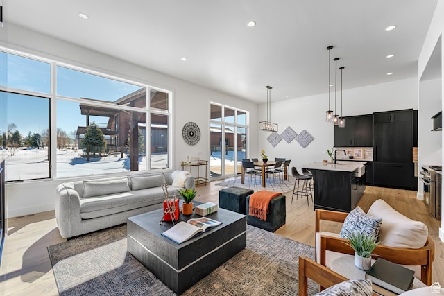 272 Thorn Creek Dr, Kamas, UT 84036 - living area featuring light wood finished floors and recessed lighting