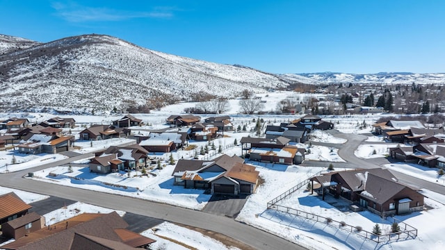 272 Thorn Creek Dr, Kamas, UT 84036 - snowy aerial view with a residential view and a mountain view