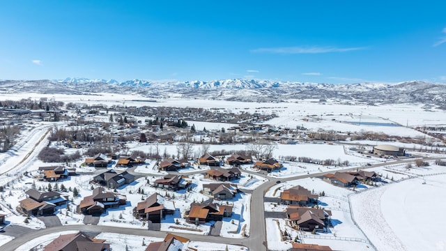 272 Thorn Creek Dr, Kamas, UT 84036 - snowy aerial view featuring a mountain view and a residential view