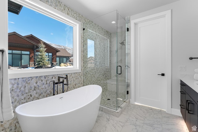 272 Thorn Creek Dr, Kamas, UT 84036 - full bath featuring a soaking tub, a shower stall, vanity, baseboards, and marble finish flooring