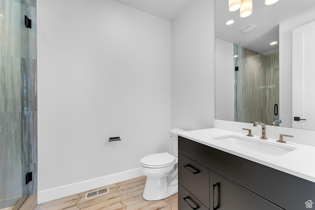 272 Thorn Creek Dr, Kamas, UT 84036 - full bath with vanity, a shower stall, toilet, wood tiled floors, and baseboards