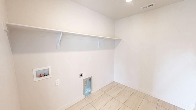 1396 S Castillo Rd W Unit 102, Spanish Fork, UT 84660 - laundry room with light tile patterned floors, hookup for a washing machine, visible vents, hookup for an electric dryer, and laundry area