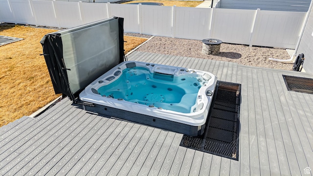 1396 S Castillo Rd W Unit 102, Spanish Fork, UT 84660 - wooden deck with a covered hot tub and fence