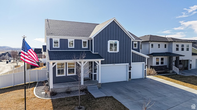 1396 S Castillo Rd W Unit 102, Spanish Fork, UT 84660 - modern inspired farmhouse featuring roof with shingles, concrete driveway, an attached garage, board and batten siding, and fence