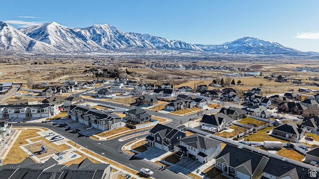 1396 S Castillo Rd W Unit 102, Spanish Fork, UT 84660 - drone / aerial view with a residential view and a mountain view
