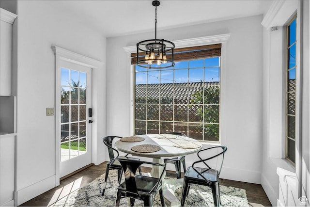 470 E 130 S, Ivins, UT 84738 - dining space featuring a chandelier, dark wood-style flooring, plenty of natural light, and baseboards