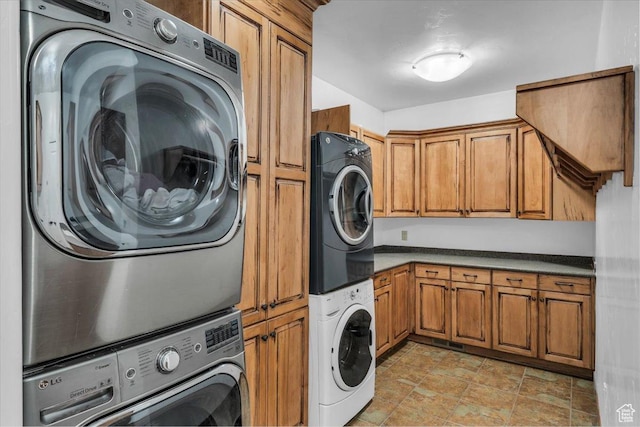 470 E 130 S, Ivins, UT 84738 - washroom featuring stacked washer and dryer and cabinet space